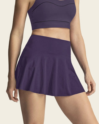 Falda deportiva con short interno con bolsillo#color_450-morado